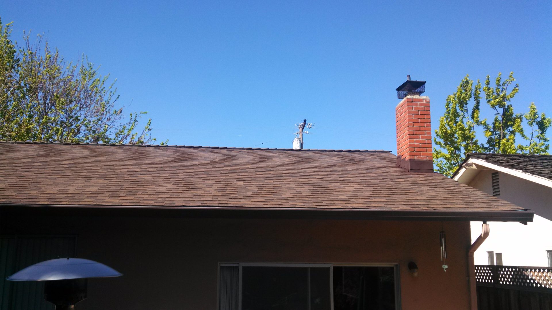 New brown shingle roof installed on a residential home in milpitas, California