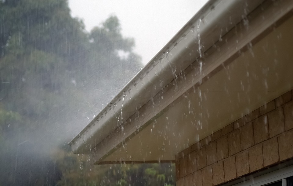 rain overflowing a gutter during a storm in Campbell, California